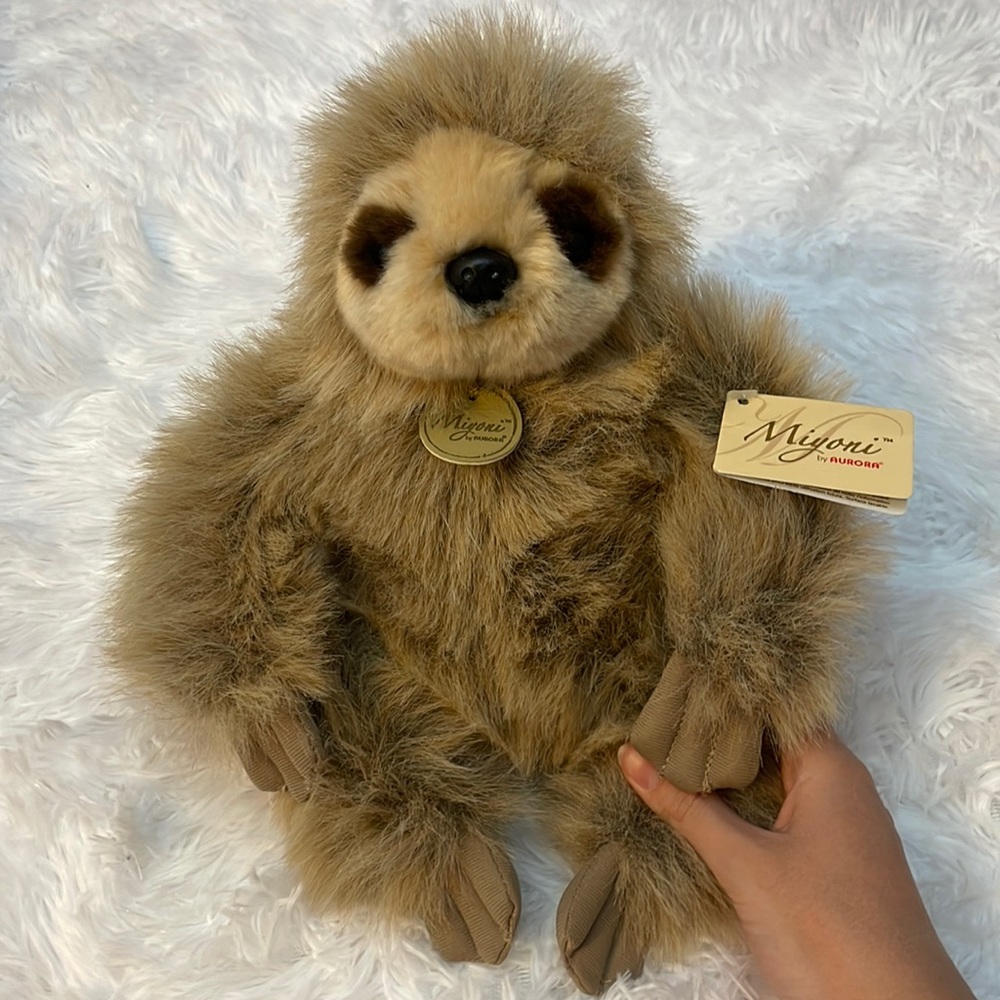 Aurora sloth plush